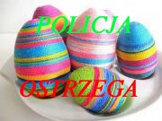 kolorowe jajka i napis policja ostrzega